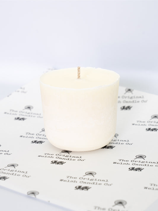 A soy candle refill which will fit in a 30cl jar various scents wrapped in greaseproof