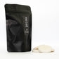 a matt black coffee like pouch containing 6 large soy wax melts scented with black pomegranate