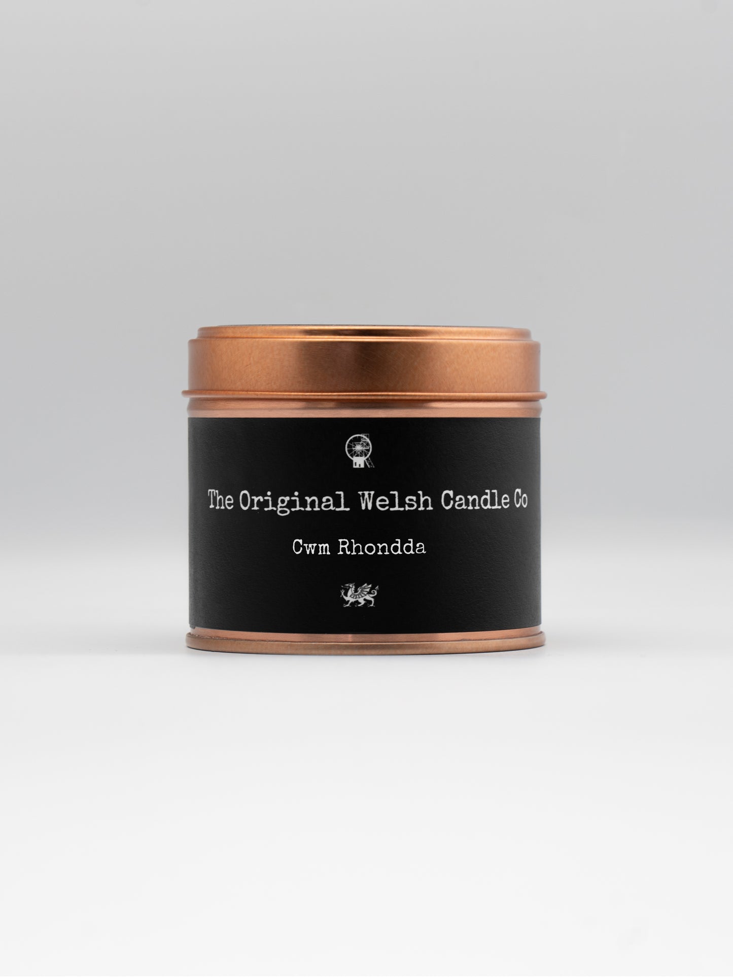 Lovely copper tin with black label very classy filled with a fresh linen soy wax