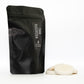 a coffee like pouch containing 6 large wax melts made with soy wax labelled with a cwm rhondda sticker